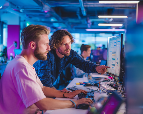 rarebitbunnies_two_men_in_front_of_a_desktop_computer_one_is__8ae26b17-8787-4311-b88b-73d97abca0cf_0